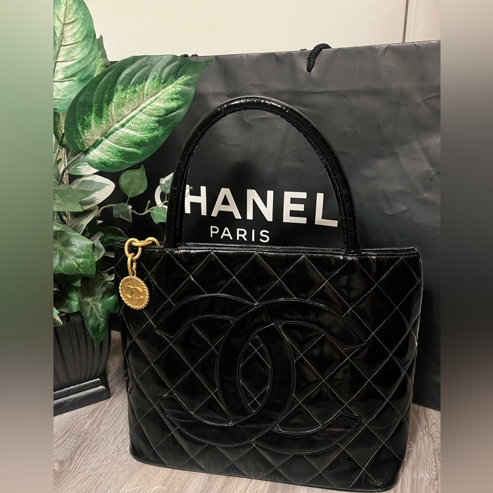 Chanel Black Quilted Medallion patent leather with 24K Gold zipper pull and COA